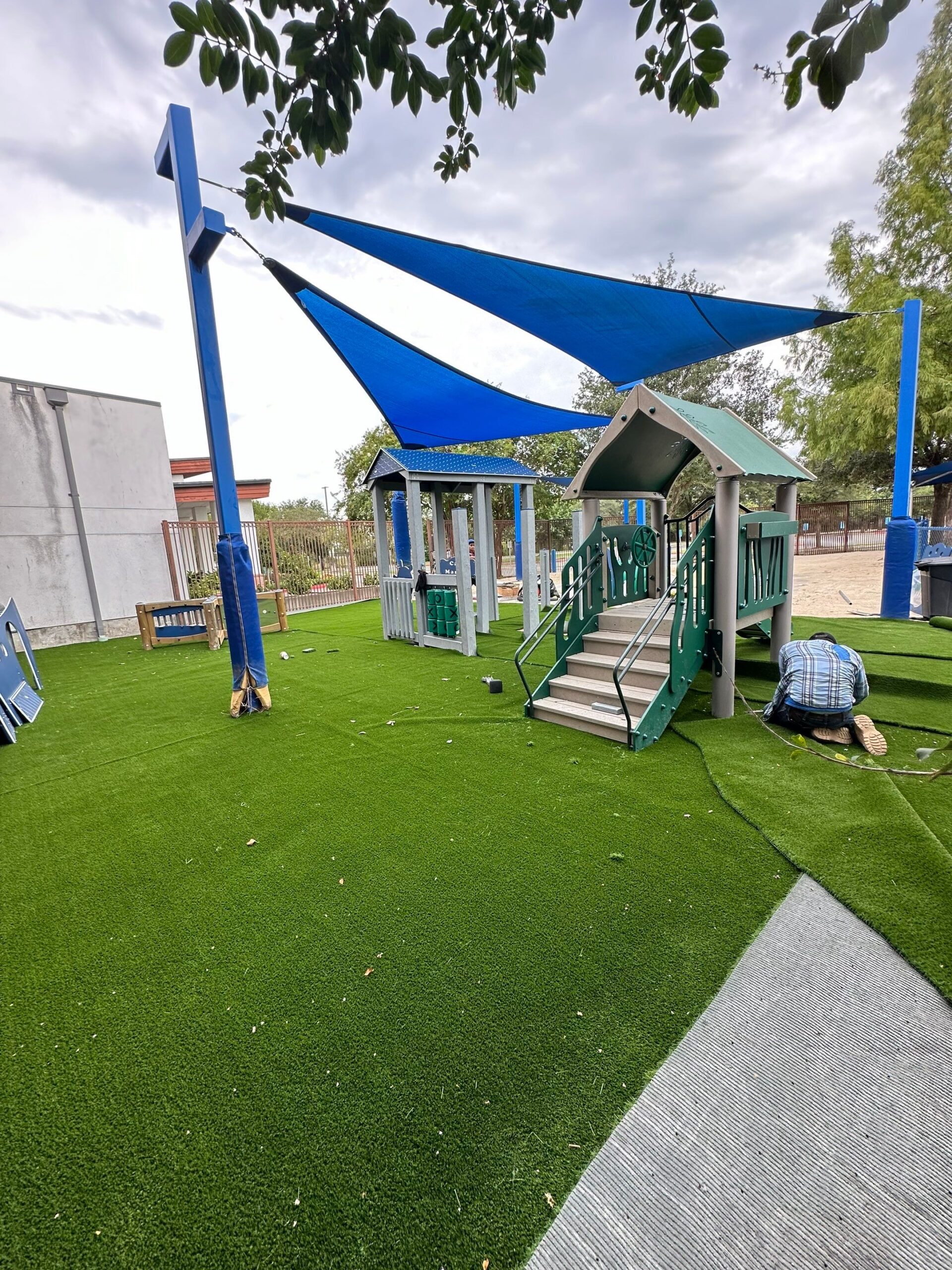 Close-up of a Houston playground featuring durable shade structures and All Play Playground equipment for schools and parks